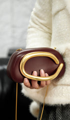 Sculpted Clutch